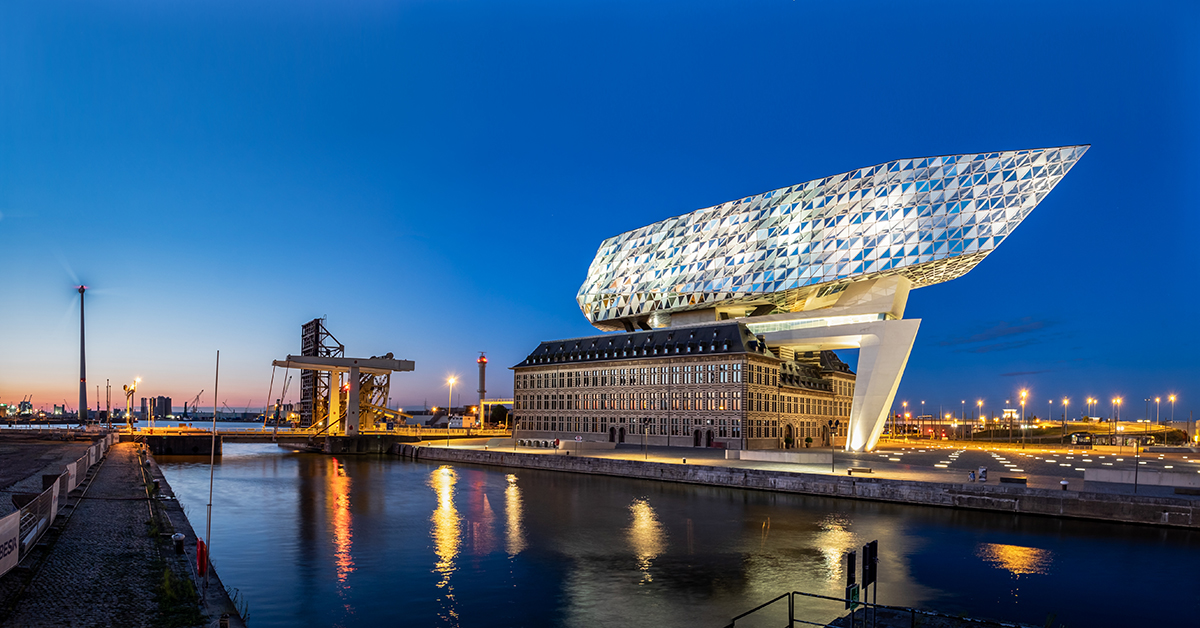 Antwerp, Belgium - 20 May 2020: A view on the Antwerp Port House building from Zaha Hadid just after sunset.